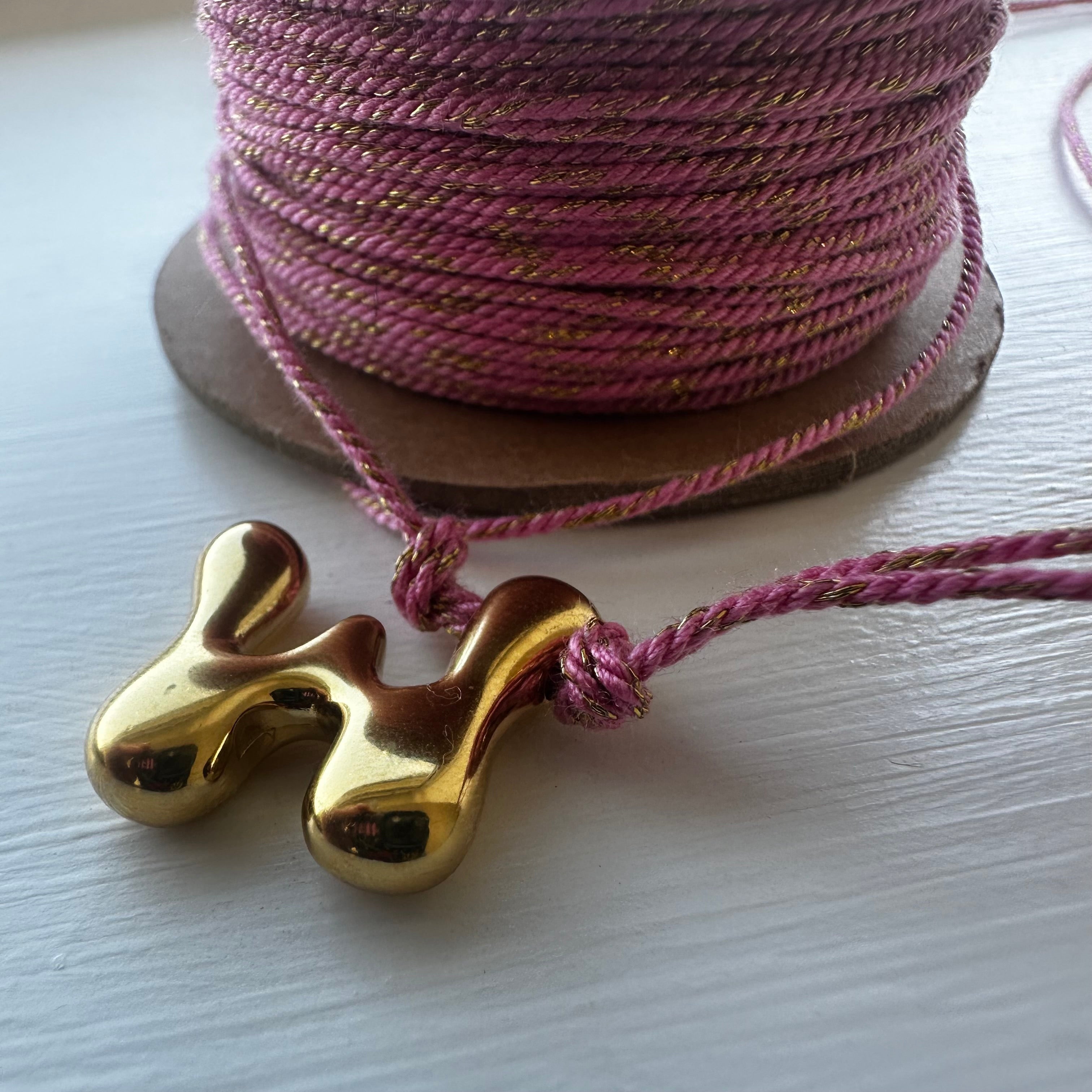 Colour threaded bubble initial bracelet