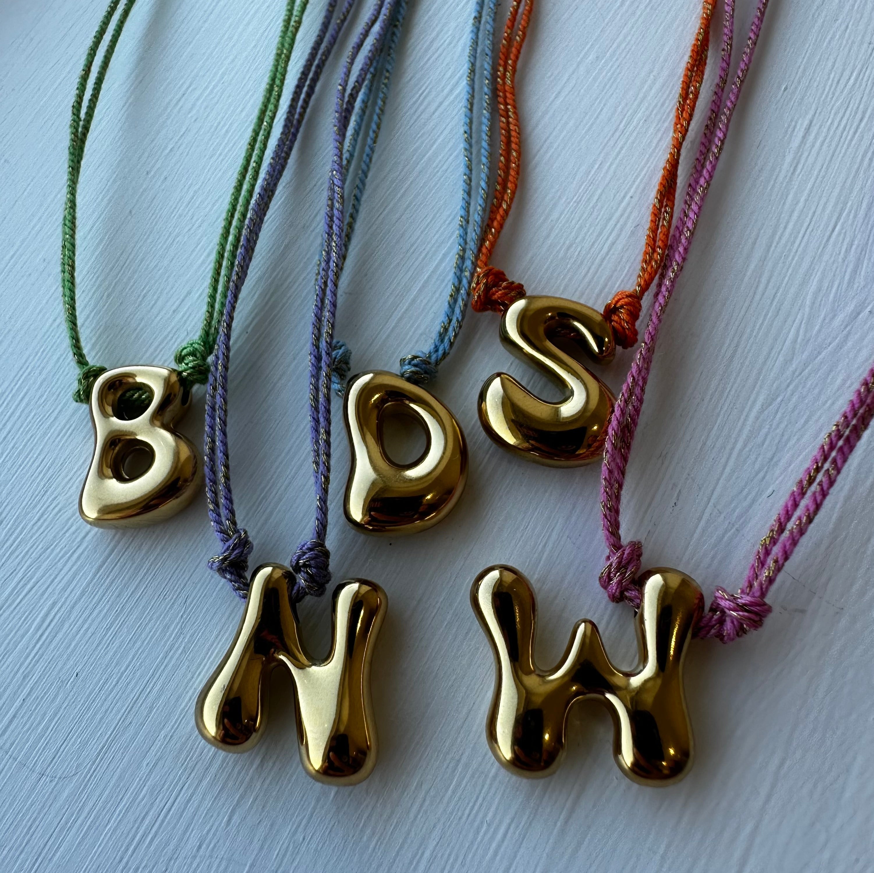 Colour threaded bubble initial bracelet